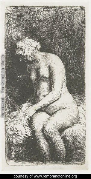 Rembrandt - A Woman bathing her Feet at a Brook