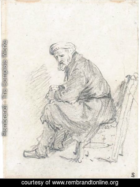 Rembrandt - An old man wearing a turban seated in profile to the left