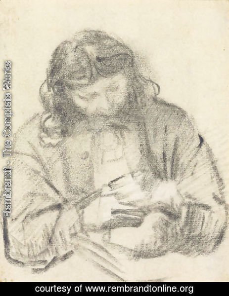 Rembrandt - Seated man, half length, at work