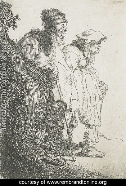 Rembrandt - Beggar man and woman behind a bank